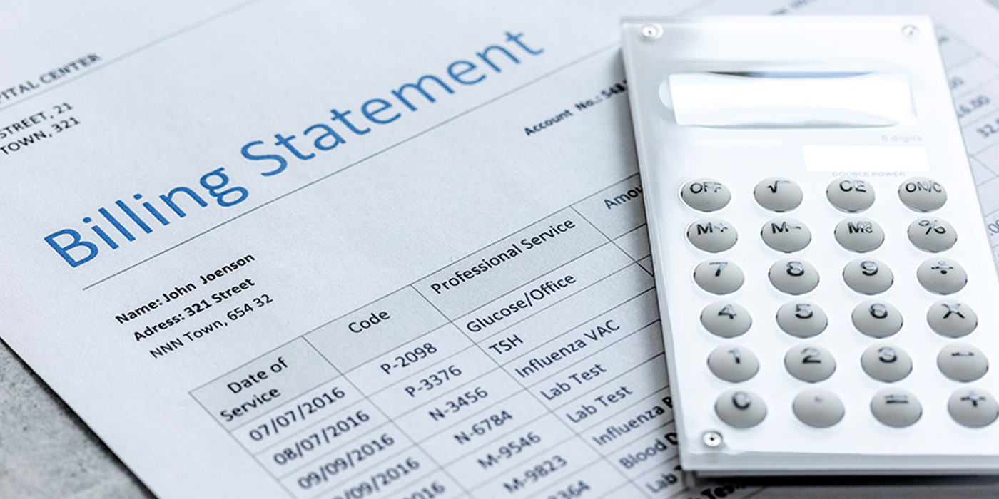 Billing statement with listed services and charges, partially covered by a white calculator on the right side