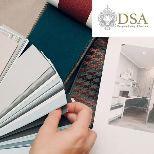 Hands flipping through paint swatches beside fabric samples and an open interior design booklet; DSA, RIDE exam, and RIDQC logos visibleProvide your feedback on BizChat